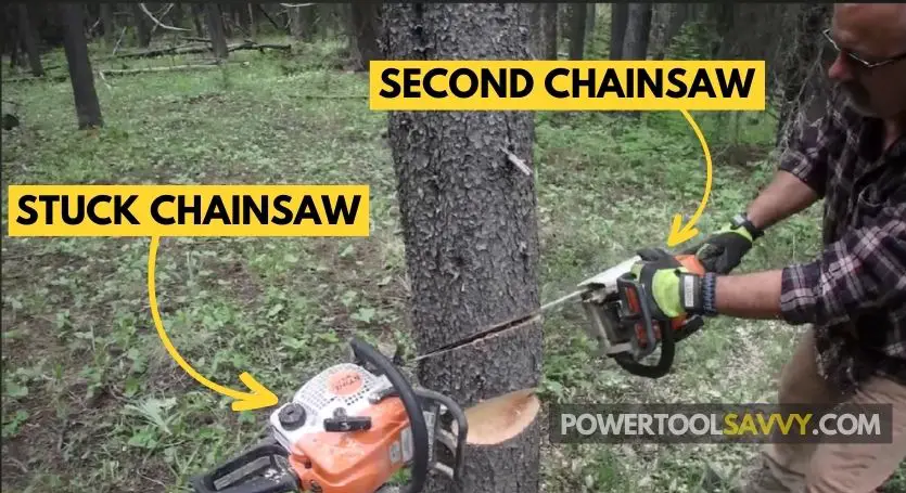 Getting stuck chainsaw out using second chainsaw