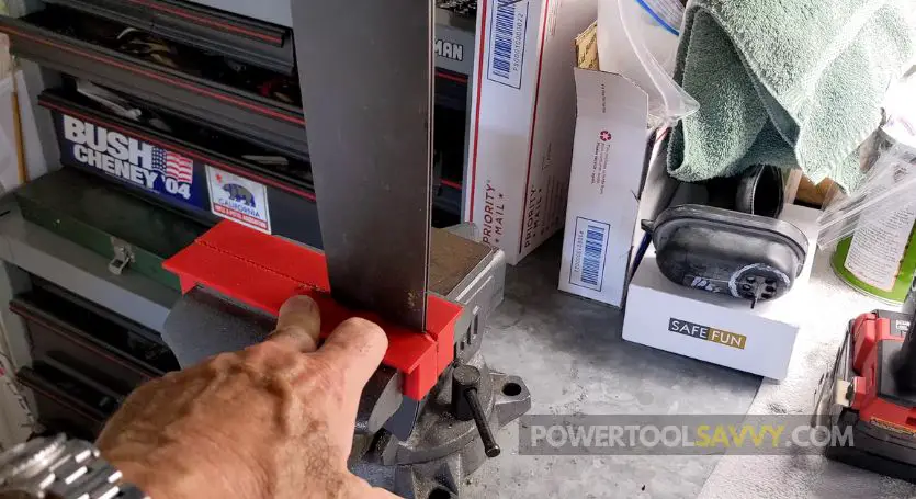clamping chainsaw bar on a vice