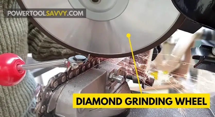 sharpening a carbide chain using a diamond wheel and a bench grinder.